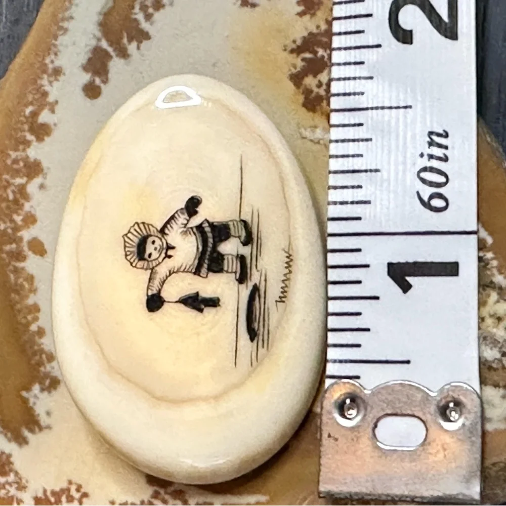 Peter Kuniliusee Clyde River vintage scrimshaw brooch little Eskimo ice fishing
